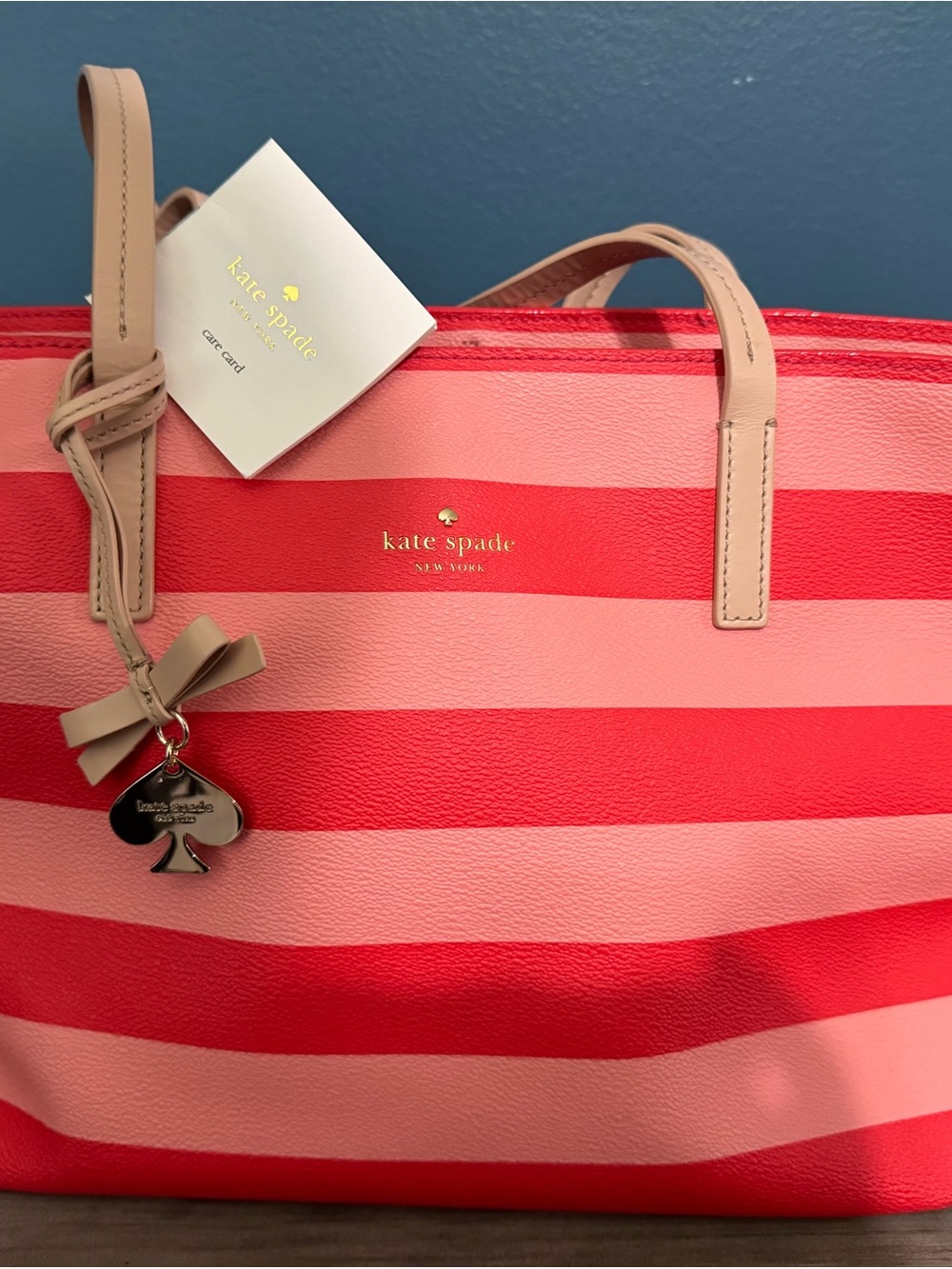 kate spade Pink and Red Striped Tote with Bow Charm
